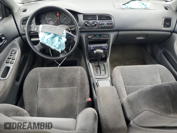 1997 Honda Accord LX with VIN 1HGCD5632VA037747, listed as a Copart auction lot 63532415 with 118,499 mi miles and Salvage title. Bid and sale history available at DreamBid. Image 8.