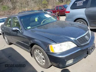 2004 Acura RL w/Navigation System with VIN JH4KA96634C006366, listed as a IAAI auction lot 42054689 with 350,809 mi miles. Bid and sale history available at carsss.com. Image 1.