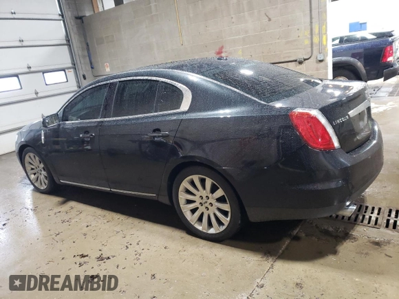 2011 Lincoln MKS EcoBoost with VIN 1LNHL9FT2BG609077, listed as a Copart auction lot 59341025 with 184,591 mi miles and Salvage title. Bid and sale history available at DreamBid. Image 2.