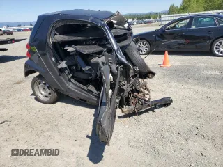2009 Smart fortwo Pure z VIN WMEEJ31X09K267836, wystawiony jako Copart lot #55500135 z przebiegiem Nie podano mil oraz Szkody całkowita. Historia ofert i sprzedaży dostępna na DreamBid. Obrazek 4.