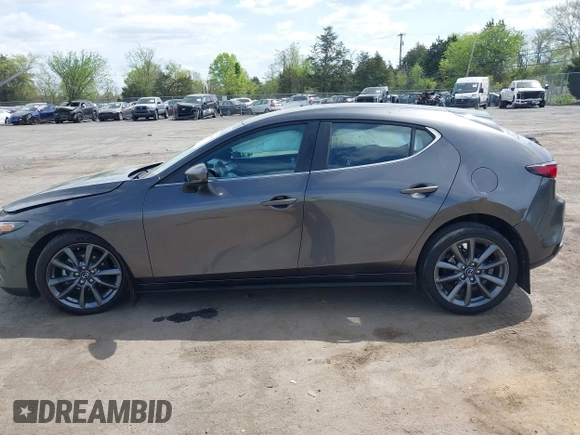 2023 Mazda 3 S Select with VIN JM1BPAKM3P1615785, listed as a IAAI auction lot 42064302 with 63,928 mi miles and . Bid and sale history available at DreamBid. Image 14.