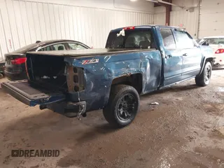2016 Chevrolet Silverado 1500 LT with VIN 1GCVKREC5GZ296369, listed as a IAAI auction lot 41262302 with 122,859 mi miles. Bid and sale history available at carsss.com. Image 4.