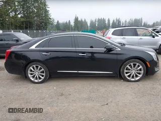 2016 Cadillac XTS Luxury Collection z VIN 2G61N5S38G9141105, wystawiony jako IAAI lot #42430714 z przebiegiem 105 122 mil mil oraz . Historia ofert i sprzedaży dostępna na DreamBid. Obrazek 13.
