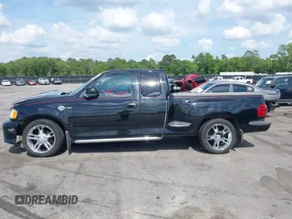 2000 Ford F-150 XL z VIN 2FTRX07L9YCA98355, wystawiony jako IAAI lot #42123587 z przebiegiem 191 000 mil mil oraz . Historia ofert i sprzedaży dostępna na DreamBid. Obrazek 14.