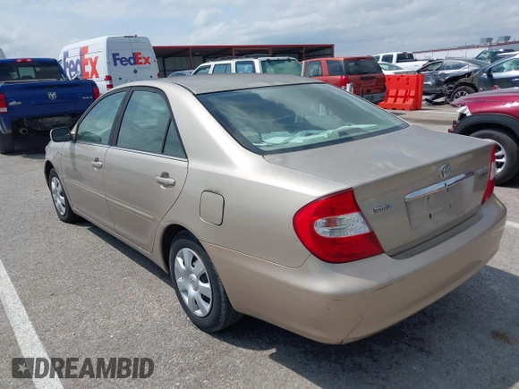 2003 Toyota Camry LE with VIN 4T1BE32K13U243738, listed as a IAAI auction lot 42120647 with Not Provided miles and . Bid and sale history available at DreamBid. Image 3.
