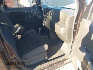 2011 Nissan Cube S z VIN JN8AZ2KR8BT202933, wystawiony jako IAAI lot #41701542 z przebiegiem 162 626 mil mil oraz . Historia ofert i sprzedaży dostępna na DreamBid. Obrazek 5.
