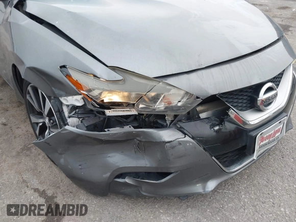 2016 Nissan Maxima SV with VIN 1N4AA6AP7GC449545, listed as a IAAI auction lot 41850689 with 97,859 mi miles and . Bid and sale history available at DreamBid. Image 6.