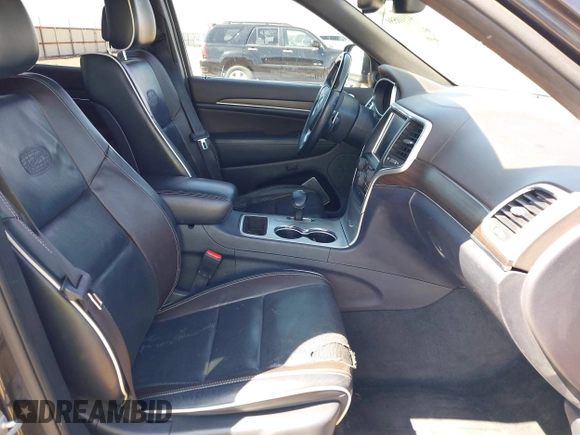 2015 Jeep Grand Cherokee Overland with VIN 1C4RJECG3FC635327, listed as a IAAI auction lot 41910559 with 118,519 mi miles and . Bid and sale history available at DreamBid. Image 5.