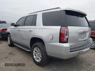 2020 GMC Yukon SLT with VIN 1GKS2BKC3LR228116, listed as a IAAI auction lot 41465949 with 91,198 mi miles. Bid and sale history available at carsss.com. Image 3.