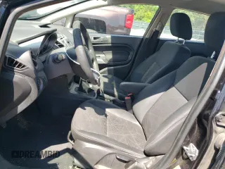 2012 Ford Fiesta SE z VIN 3FADP4BJ5CM195837, wystawiony jako Copart lot #57363165 z przebiegiem 108 003 mil mil oraz Szkoda całkowita • Salvage title. Historia ofert i sprzedaży dostępna na DreamBid. Obrazek 7.