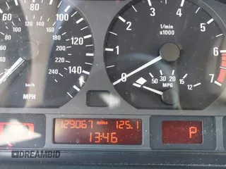 1999 BMW 3 Series 323i with VIN WBAAM3336XFP55691, listed as a IAAI auction lot 42033522 with 129,067 mi miles. Bid and sale history available at carsss.com. Image 7.