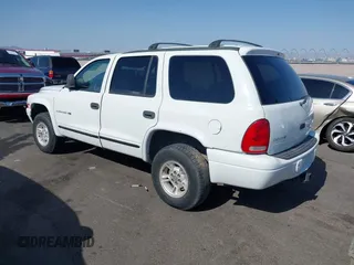 1999 Dodge Durango z VIN 1B4HS28Y1XF619973, wystawiony jako IAAI lot #42399672 z przebiegiem 192 812 mil mil oraz . Historia ofert i sprzedaży dostępna na DreamBid. Obrazek 3.