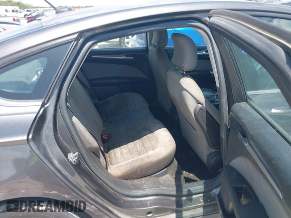 2016 Ford Fusion S with VIN 3FA6P0G74GR243769, listed as a IAAI auction lot 42566152 with 205,474 mi miles and . Bid and sale history available at DreamBid. Image 8.