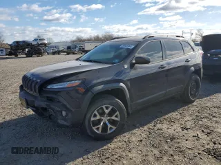 2014 Jeep Cherokee Trailhawk with VIN 1C4PJMBB6EW285745, listed as a Copart auction lot 86968964 with 125,922 mi miles and Salvage Title. Bid and sale history available at carsss.com. Image 1.