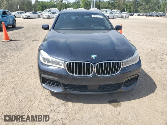 2016 BMW 7 Series 750i z VIN WBA7F0C57GGM20650, wystawiony jako Copart lot #57177555 z przebiegiem 113 632 mil mil oraz Czysty tytuł • Clean title. Historia ofert i sprzedaży dostępna na DreamBid. Obrazek 5.