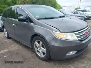 2012 Honda Odyssey Touring с VIN 5FNRL5H91CB028541, выставлен на аукционе IAAI как лот 42288435 с пробегом 169 543 миль миль и . История ставок и продаж доступна на DreamBid. Изображение 1.