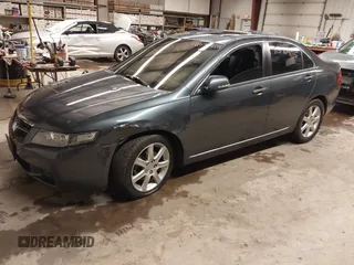 2005 Acura TSX with VIN JH4CL96975C034682, listed as a IAAI auction lot 41596405 with 228,889 mi miles and . Bid and sale history available at DreamBid. Image 2.