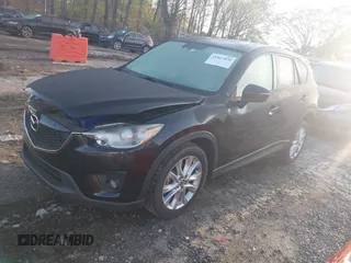 2015 Mazda CX-5 Grand Touring with VIN JM3KE4DY6F0513173, listed as a IAAI auction lot 41867030 with 93,770 mi miles. Bid and sale history available at carsss.com. Image 17.