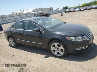 2013 Volkswagen CC R-Line z VIN WVWBN7AN3DE512289, wystawiony jako Copart lot #51865735 z przebiegiem 69 799 mil mil oraz Szkoda całkowita • Salvage title. Historia ofert i sprzedaży dostępna na DreamBid. Obrazek 4.