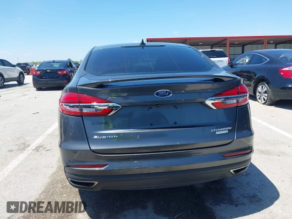 2020 Ford Fusion Titanium with VIN 3FA6P0K96LR173971, listed as a IAAI auction lot 42232469 with 82,474 mi miles and . Bid and sale history available at DreamBid. Image 17.