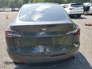 2024 Tesla Model Y с VIN 7SAYGDED1RF092027, выставлен на аукционе Copart как лот 62330775 с пробегом 22 010 миль миль и Списание • Salvage title. История ставок и продаж доступна на DreamBid. Изображение 6.
