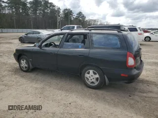 1999 Daewoo Nubira CDX z VIN KLAJB82Z5XK301054, wystawiony jako Copart lot #48227355 z przebiegiem 66 730 mil mil oraz Szkody całkowita. Historia ofert i sprzedaży dostępna na DreamBid. Obrazek 2.