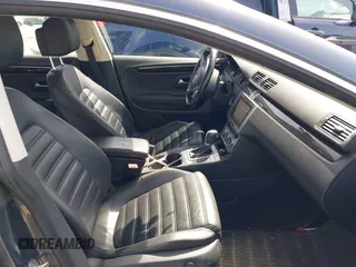 2014 Volkswagen CC Lux with VIN WVWRP7AN7EE501483, listed as a IAAI auction lot 42090985 with 121,737 mi miles. Bid and sale history available at carsss.com. Image 5.