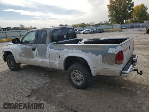 1997 Dodge Dakota z VIN 1B7GG23Y8VS161313, wystawiony jako Copart lot #77646454 z przebiegiem 286 443 mil mil oraz Szkoda całkowita • Salvage title. Historia ofert i sprzedaży dostępna na DreamBid. Obrazek 2.