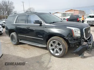 2016 GMC Yukon SLT with VIN 1GKS1BKC3GR272738, listed as a IAAI auction lot 41712439 with 169,726 mi miles. Bid and sale history available at carsss.com. Image 13.