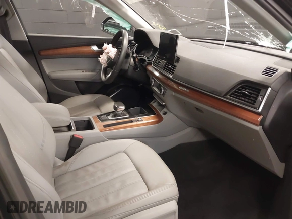 2022 Audi Q5 S line Premium z VIN WA1GAAFY2N2049219, wystawiony jako IAAI lot #41772929 z przebiegiem 17 625 mil mil oraz . Historia ofert i sprzedaży dostępna na DreamBid. Obrazek 5.