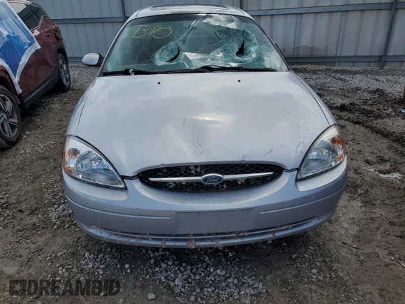 2002 Ford Taurus SES Standard with VIN 1FAFP55U02A115781, listed as a Copart auction lot 59007595 with 97,189 mi miles and Salvage title. Bid and sale history available at DreamBid. Image 5.