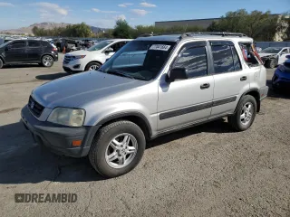 2000 Honda CR-V LX with VIN JHLRD1849YC047923, listed as a Copart auction lot 77041664 with 235,211 mi miles and Salvage Title. Bid and sale history available at carsss.com. Image 1.