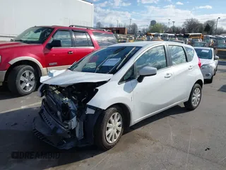 2016 Nissan Note S z VIN 3N1CE2CP0GL384560, wystawiony jako IAAI lot #41816395 z przebiegiem 96 941 mil mil oraz . Historia ofert i sprzedaży dostępna na DreamBid. Obrazek 2.