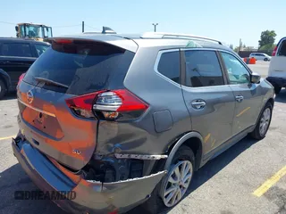 2017 Nissan Rogue SV with VIN KNMAT2MT9HP588530, listed as a IAAI auction lot 42560615 with 87,265 mi miles and . Bid and sale history available at DreamBid. Image 4.