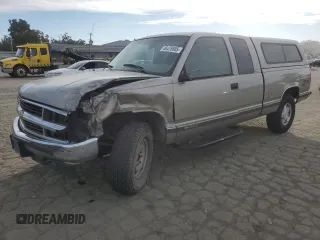 1998 Chevrolet Silverado 1500 with VIN 1GCEK19R1WE171942, listed as a Copart auction lot 46476505 with 219,527 mi miles and Salvage Title. Bid and sale history available at DreamBid. Image 1.