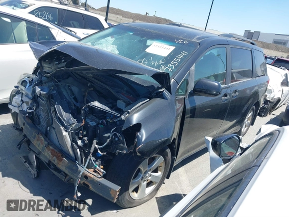 2014 Toyota Sienna L with VIN 5TDZK3DC2ES449563, listed as a IAAI auction lot 37355441 with 246,582 mi miles and . Bid and sale history available at DreamBid. Image 18.