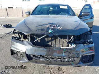 2019 BMW 5 Series M550i xDrive with VIN WBAJB9C51KB288416, listed as a IAAI auction lot 41265378 with 52,529 mi miles and . Bid and sale history available at DreamBid. Image 6.