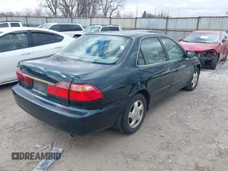 2000 Honda Accord EX z VIN JHMCG5659YC001925, wystawiony jako IAAI lot #41715654 z przebiegiem 190 605 mil mil oraz . Historia ofert i sprzedaży dostępna na DreamBid. Obrazek 4.