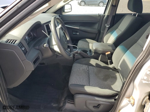 2009 Jeep Grand Cherokee Laredo with VIN 1J8GR48K09C551423, listed as a Copart auction lot 54094465 with 163,263 mi miles and Clean Title. Bid and sale history available at carsss.com. Image 7.