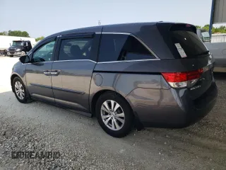 2014 Honda Odyssey EX-L with VIN 5FNRL5H60EB125478, listed as a Copart auction lot 59218355 with 165,928 mi miles and Salvage title. Bid and sale history available at DreamBid. Image 2.