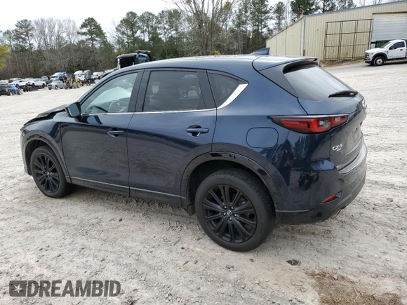 2022 Mazda CX-5 2.5 Turbo with VIN JM3KFBAY3N0603921, listed as a Copart auction lot 43679495 with 27,073 mi miles and Salvage Title. Bid and sale history available at carsss.com. Image 2.
