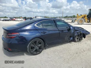 2023 Genesis G70 2.0T with VIN KMTG34TA5PU110175, listed as a Copart auction lot 58297715 with 43,716 mi miles and Salvage title. Bid and sale history available at DreamBid. Image 3.