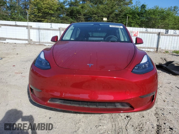 2024 Tesla Model Y Long Range with VIN 7SAYGDEE6RA318973, listed as a Copart auction lot 55586435 with 8,700 mi miles and Salvage title. Bid and sale history available at DreamBid. Image 5.