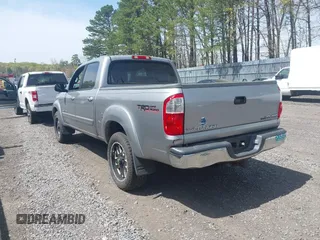 2004 Toyota Tundra SR5 with VIN 5TBDT44174S434897, listed as a IAAI auction lot 42128806 with 218,054 mi miles and . Bid and sale history available at DreamBid. Image 3.