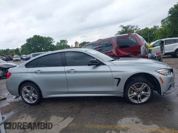 2016 BMW 4 Series 428i xDrive z VIN WBA4C9C57GG137858, wystawiony jako IAAI lot #42755021 z przebiegiem 92 728 mil mil oraz . Historia ofert i sprzedaży dostępna na DreamBid. Obrazek 14.