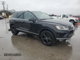 2017 Volkswagen Touareg Wolfsburg Edition z VIN WVGRF7BPXHD006302, wystawiony jako Copart lot #44783475 z przebiegiem 138 244 mil mil oraz Czysty tytuł • Clean title. Historia ofert i sprzedaży dostępna na DreamBid. Obrazek 4.