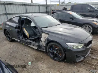 2015 BMW M4 with VIN WBS3R9C56FF708654, listed as a Copart auction lot 40082774 with 82,713 mi miles and Clean Title. Bid and sale history available at carsss.com. Image 4.