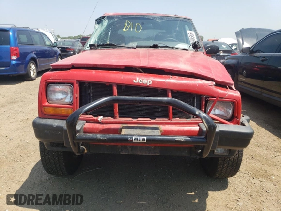 1999 Jeep Cherokee Sport z VIN 1J4FF68SXXL662401, wystawiony jako Copart lot #59698565 z przebiegiem Nie podano mil oraz Szkoda całkowita • Salvage title. Historia ofert i sprzedaży dostępna na DreamBid. Obrazek 5.