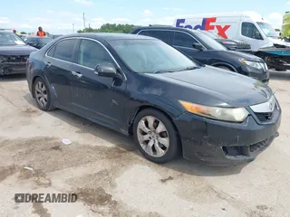 2009 Acura TSX z VIN JH4CU26619C023158, wystawiony jako IAAI lot #42371439 z przebiegiem 217 499 mil mil oraz . Historia ofert i sprzedaży dostępna na DreamBid. Obrazek 1.