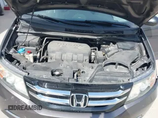 2014 Honda Odyssey EX-L with VIN 5FNRL5H67EB106183, listed as a IAAI auction lot 42210600 with 196,166 mi miles and . Bid and sale history available at DreamBid. Image 10.